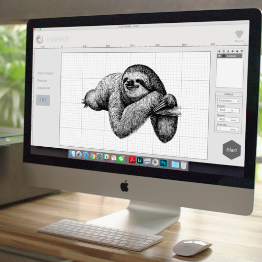 Beam Studio open on an iMac with a sloth illustration on screen.